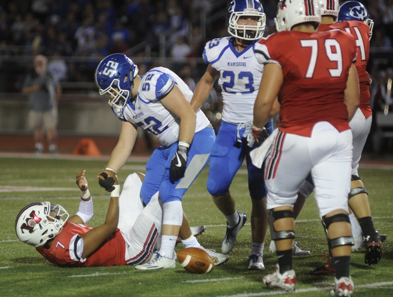 Wayne QB Rashad McKee (bottom) gets a lift from Miamisburg’s Joel Elder. Wayne defeated visiting Miamisburg 56-28 in a Week 4 GWOC crossover high school football game on Friday, Sept. 15, 2017. MARC PENDLETON / STAFF