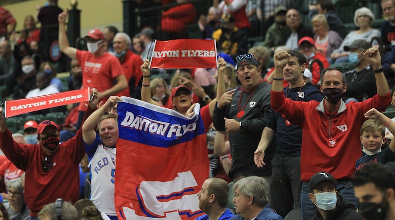 Dayton fans cheer during a game against Belmont on Sunday, Nov. 28, 2021, in the championship game of the ESPN Events Invitational at HP Fieldhouse in Kissimmee, Fla. David Jablonski/Staff
