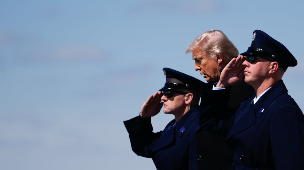 President Donald Trump arrives on Air Force One, Wednesday, March 18, 2026, at Dover Air Force Base, Del., to attend the casualty return for the six crew members of an Air Force refueling aircraft who died when their plane crashed in western Iraq while supporting operations against Iran. (AP Photo/Julia Demaree Nikhinson)