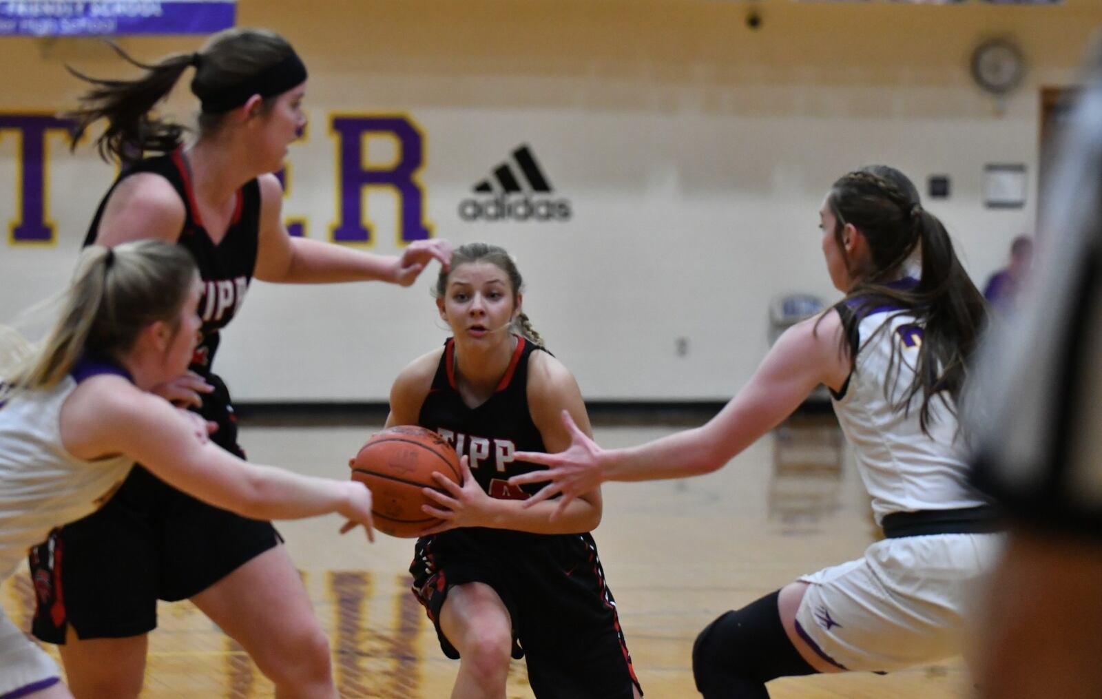Tipp’s Kendall Clodfelter looks for room against Butler’s defense. Greg Billing / Contributed