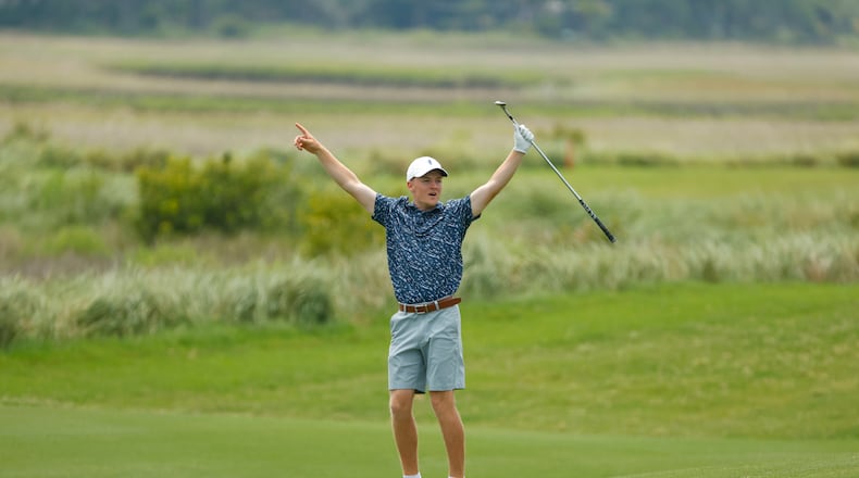 Tyler Goecke reacts after holing out his approach shot on hole 15 during the round of 32 of the 2023 U.S. Amateur Four-Ball at Kiawah Island Club (Cassique) in Kiawah Island, S.C. on Monday, May 22, 2023. (Chris Keane/USGA)