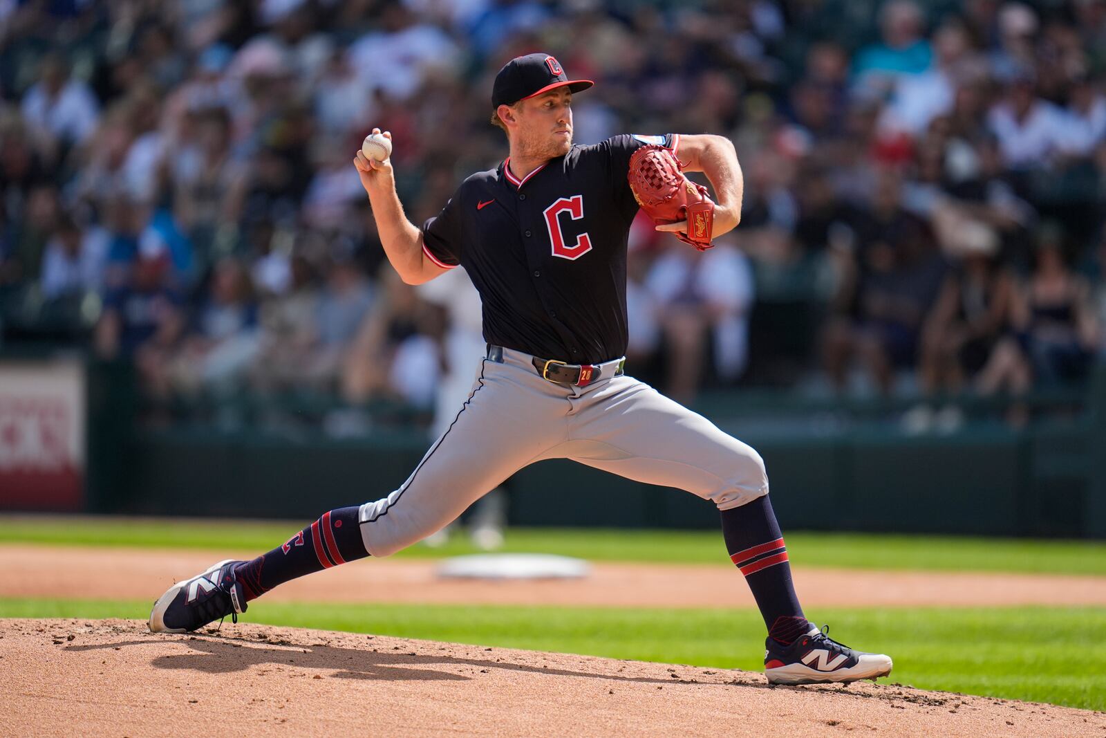Cleveland Guardians starting pitcher Tanner Bibee throws against the Chicago White Sox during the first inning of a baseball game Saturday, July 12, 2025, in Chicago. (AP Photo/Erin Hooley)