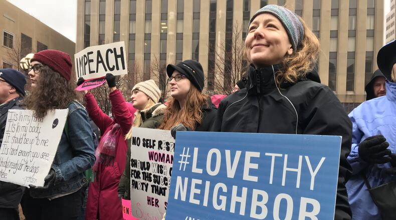 Despite the rainy weekend weather, people gathered at Courthouse Square in Downtown Dayton Saturday, January 18, for the 2020 Dayton Women’s March. Staff photo / Sarah Franks