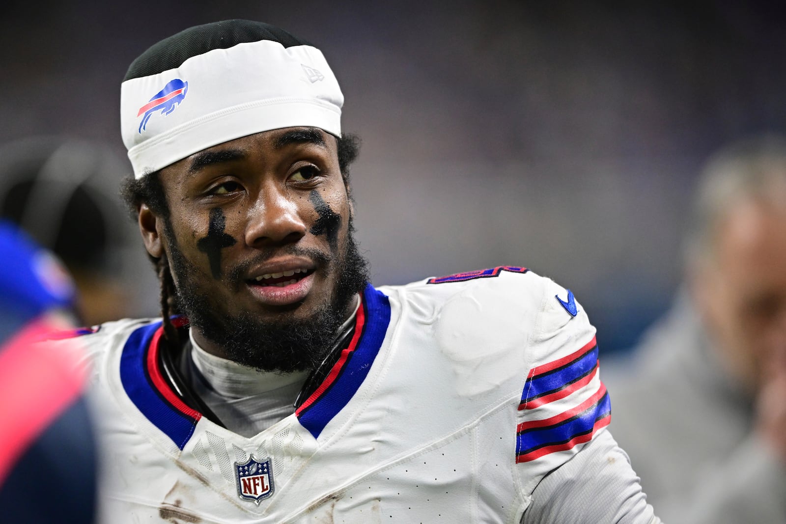 FILE - Buffalo Bills running back James Cook talks on the sideline during the second half of an NFL football game against the Detroit Lions in Detroit, Sunday, Dec. 15, 2024. The Bills won 48-42. (AP Photo/David Dermer, File)