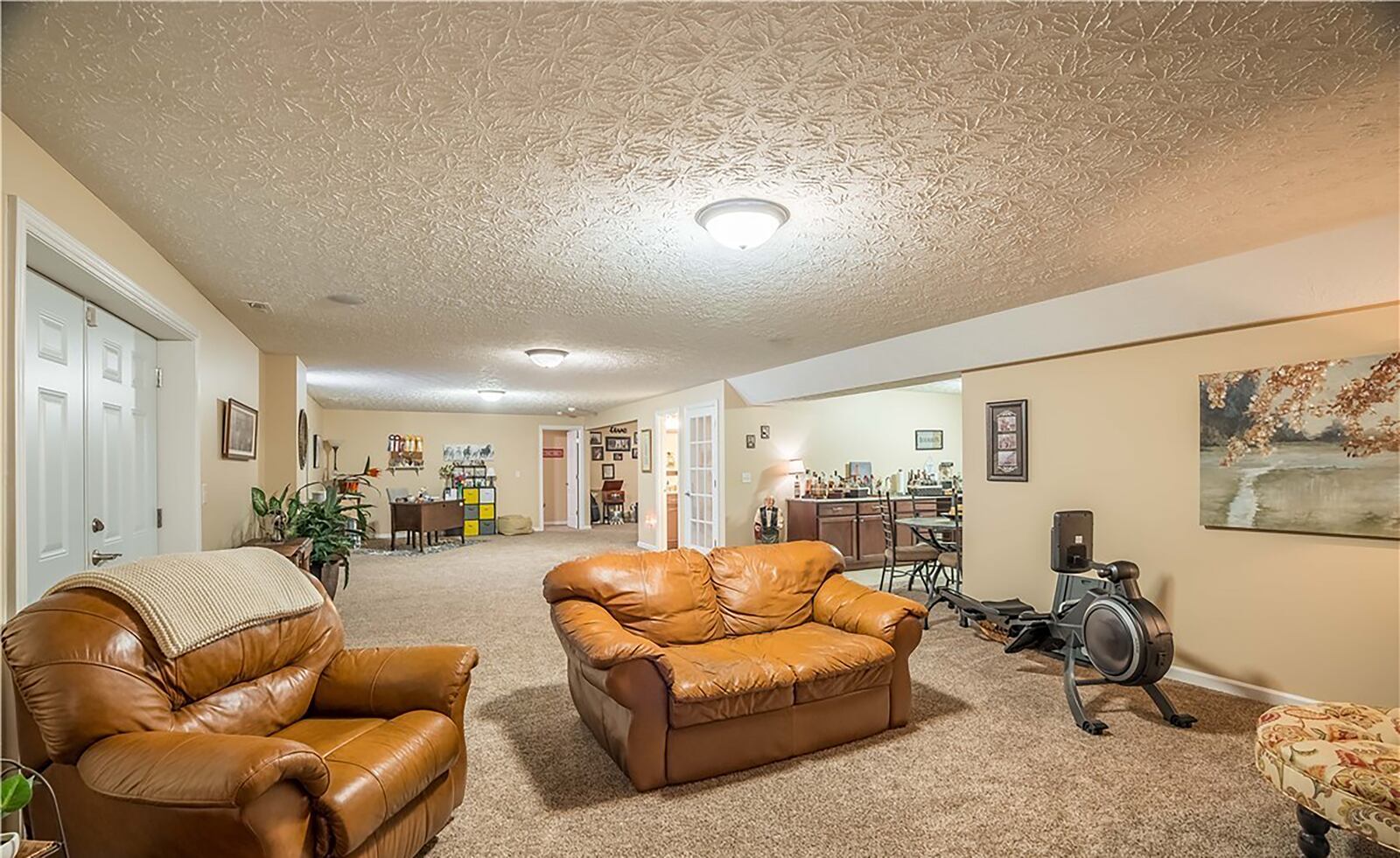 The finished basement has a recreation room and wet bar, a fourth bedroom and full bathroom. CONTRIBUTED