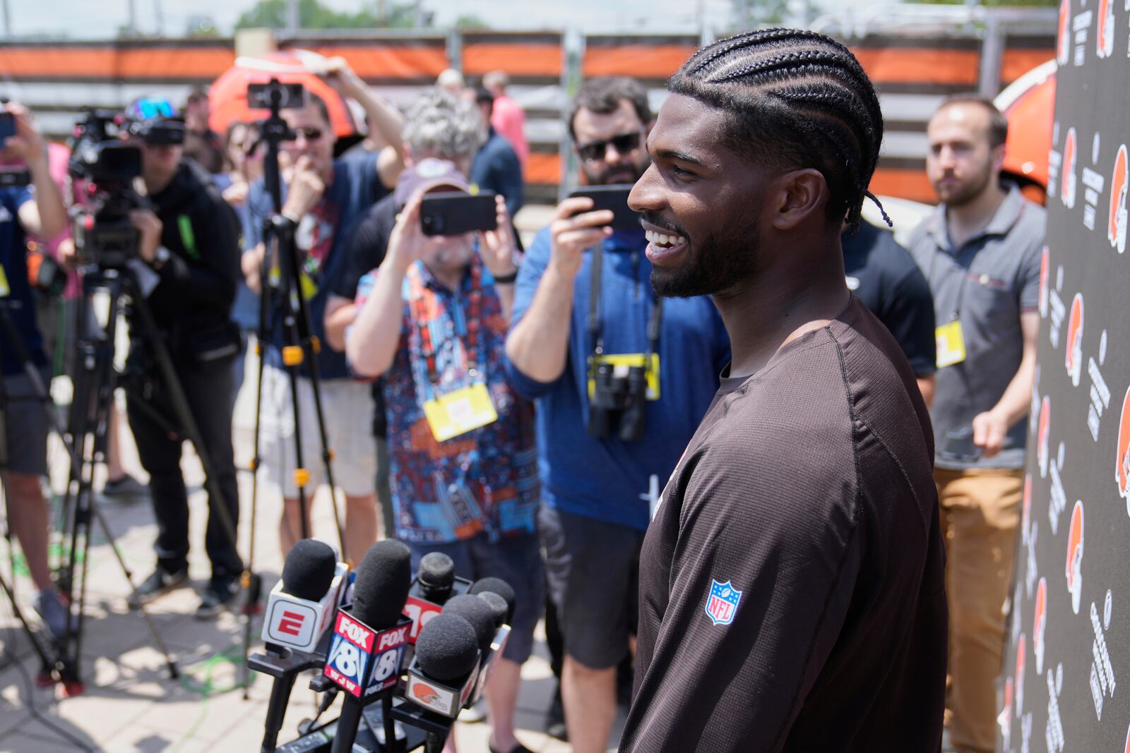Cleveland Browns quarterback Shedeur Sanders (12) answers a question during a news conference at NFL football minicamp in Berea, Ohio, Tuesday, June 10, 2025. (AP Photo/Sue Ogrocki)
