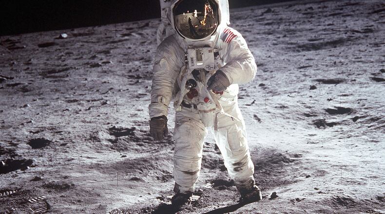 This NASA photo shows Astronaut Buzz Aldrin, lunar module pilot, walks on the surface of the Moon near the leg of the Lunar Module "Eagle" during the Apollo 11 exravehicular activity.