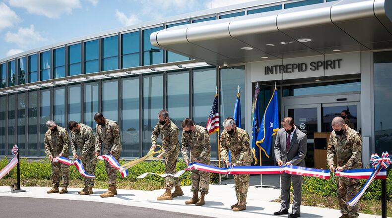 Brig. Gen. Scott Cain, 96th Test Wing commander, and Eglin Air Force Base leaders, cut a ribbon to mark the opening of Eglin AFB’s Intrepid Spirit Center. The EISC was a donation from the Intrepid Fallen Heroes Fund to the Department of Defense. It is the first on an Air Force base and the eighth of 10 located on military installations nationwide. (U.S. Air Force photo/Ilka Cole)