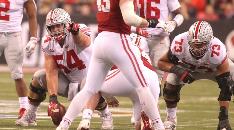 Ohio State’s Billy Price, left, prepares for a snap against Wisconsin on Saturday, Dec. 2, 2017, at Lucas Oil Stadium in Indianapolis. David Jablonski/Staff
