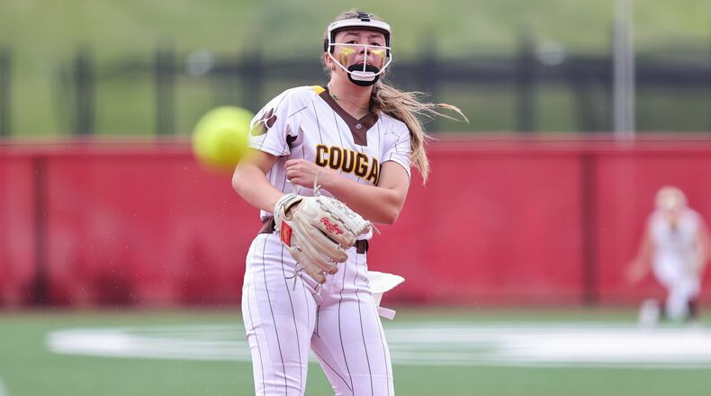 Kenton Ridge High School freshman pitcher Ivee Rastatter delivers a pitch to the plate during their Division IV state championship game against Hillsboro on Thursday, June 5 at Akron's Firestone Stadium. The Cougars won 9-0. MICHAEL COOPER / STAFF