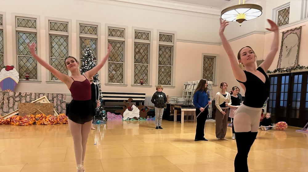 Lena Smith, left, will portray Clara and Moriah Smith, in her 20th year of participation, will perform in several roles during this weekend's 36th annual performance of "The Nutcracker" presented by the Ohio Performing Arts Institute at the Clark State Performing Arts Center. BRETT TURNER/CONTRIBUTOR