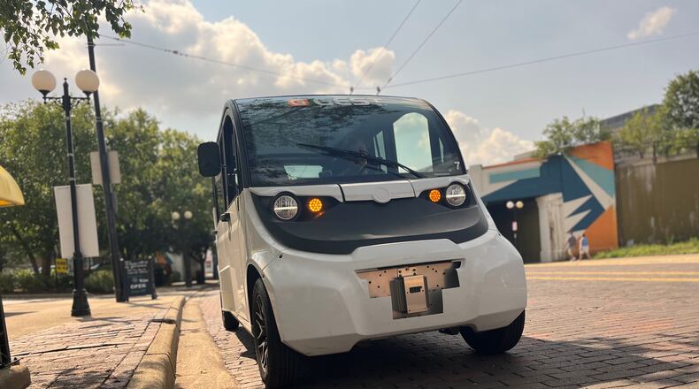 GEST Dayton, a new electric cart ride service, offered free rides in downtown Dayton during Art in the City on Saturday, Aug. 3, 2024. CORNELIUS FROLIK / STAFF