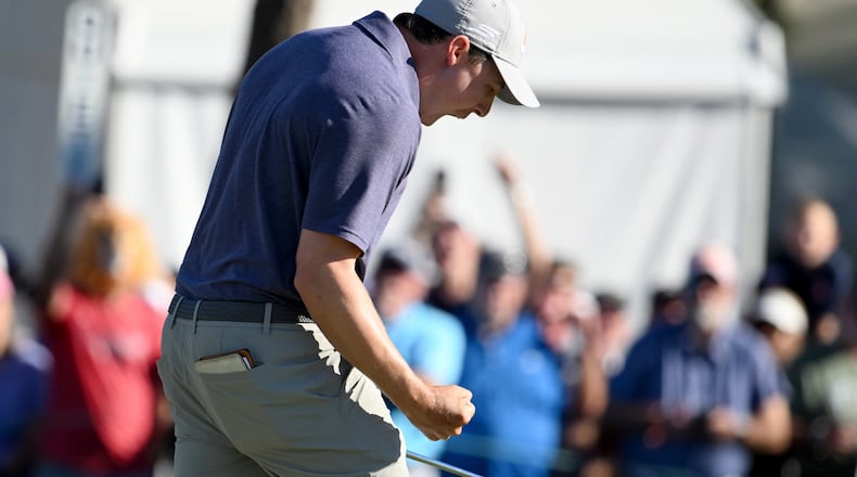 Matt Fitzpatrick celebrates his birdie putt on the 18th hole during the final round of the Valspar Championship golf tournament Sunday, March 22, 2026, in Palm Harbor, Fla. (AP Photo/Jason Behnken)