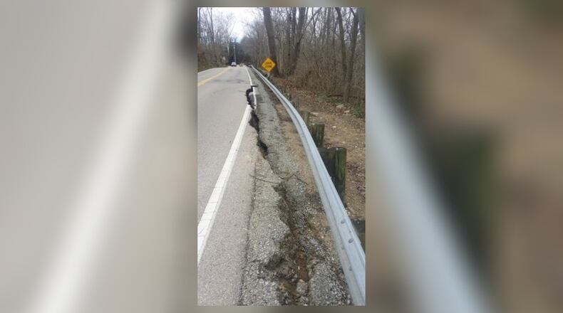 The area’s significant rainfall from last weekend is believed to be the cause that led to part of Little Sugarcreek Road, just north of Ohio 725 in Bellbrook, to fall away.