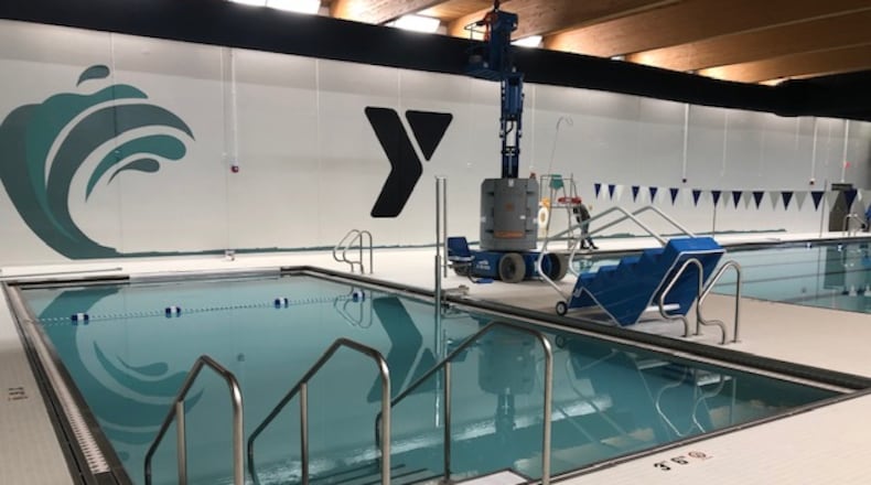 Fitness equipment and other items at the Xenia YMCA were moved Friday to the organization's new home at the 75,200 square-foot REACH Center, 336 S. Progress Drive. The facility on Church Street was closed Friday night, but it will be open for new membership sales through the weekend and holiday. The YMCA for Greene County is scheduled to reopen at its new location at 5 a.m. Jan. 2, 2019.