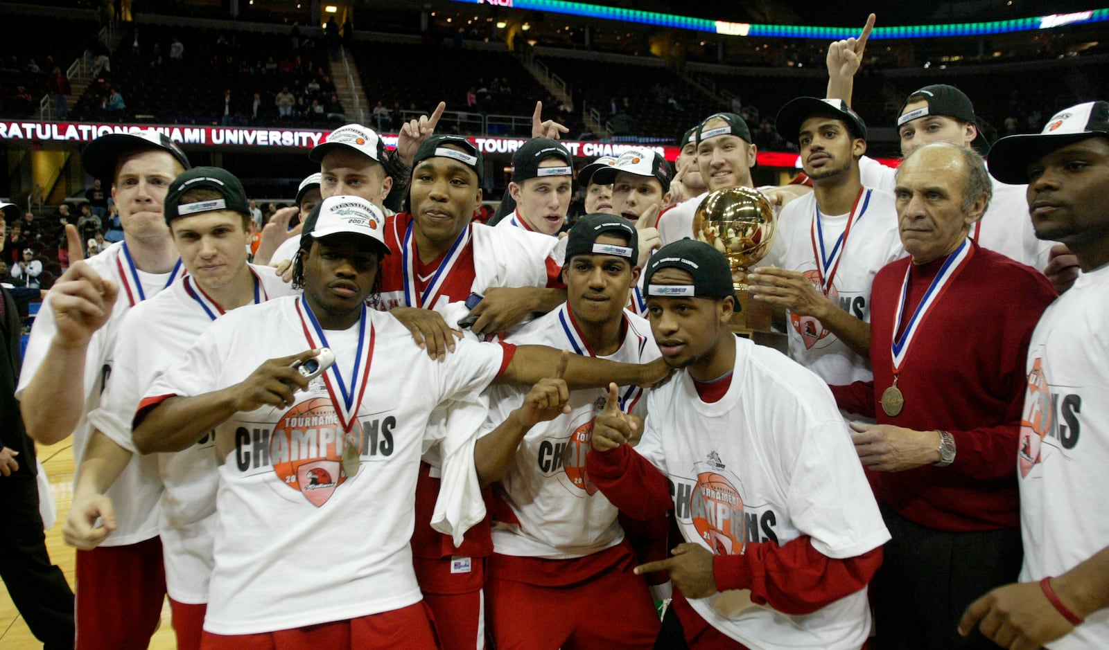 Miami players celebrate after they beat Akron 53-52 in the Mid-American Conference men's basketball tournament championship game, Saturday, March 10, 2007, in Cleveland. (AP Photo/Ron Schwane)