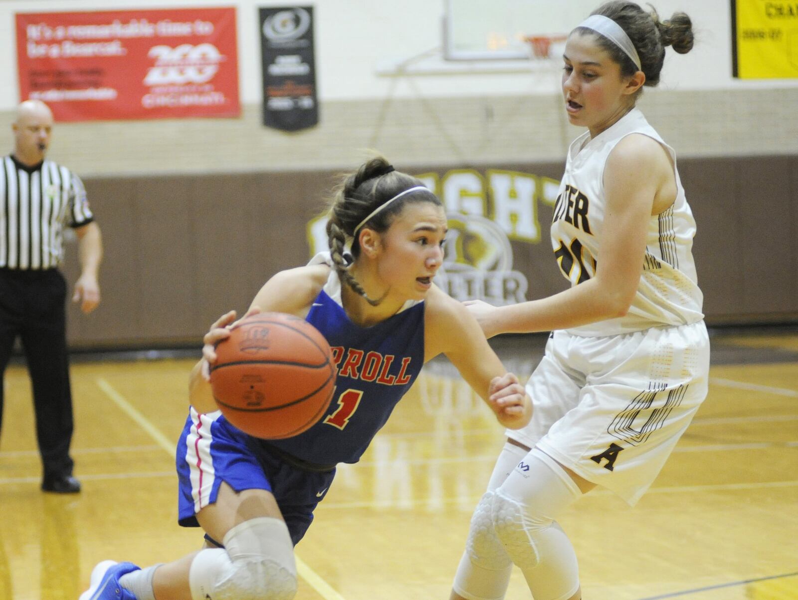 Carroll’s Ava Lickliter (left) drives on Alter’s Caraline Kernan. Carroll defeated host Alter 43-32 in a girls high school basketball game on Wednesday, Jan. 9, 2019. MARC PENDLETON / STAFF