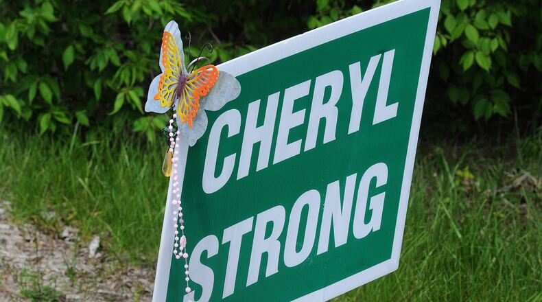 A small memorial along Waynesville Jamestown Road near where Cheryl Cokers body was found. MARSHALL GORBYSTAFF