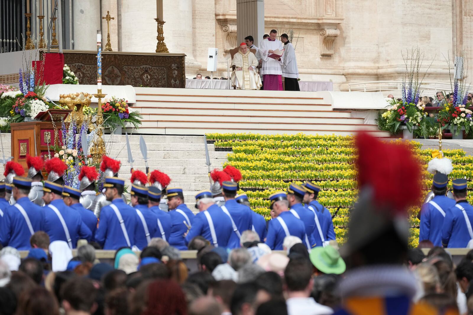 Cardinal Angelo Comastri presides over the Easter mass in St. Peter's Square at the Vatican Sunday, April 20, 2025. (AP Photo/Andrew Medichini)