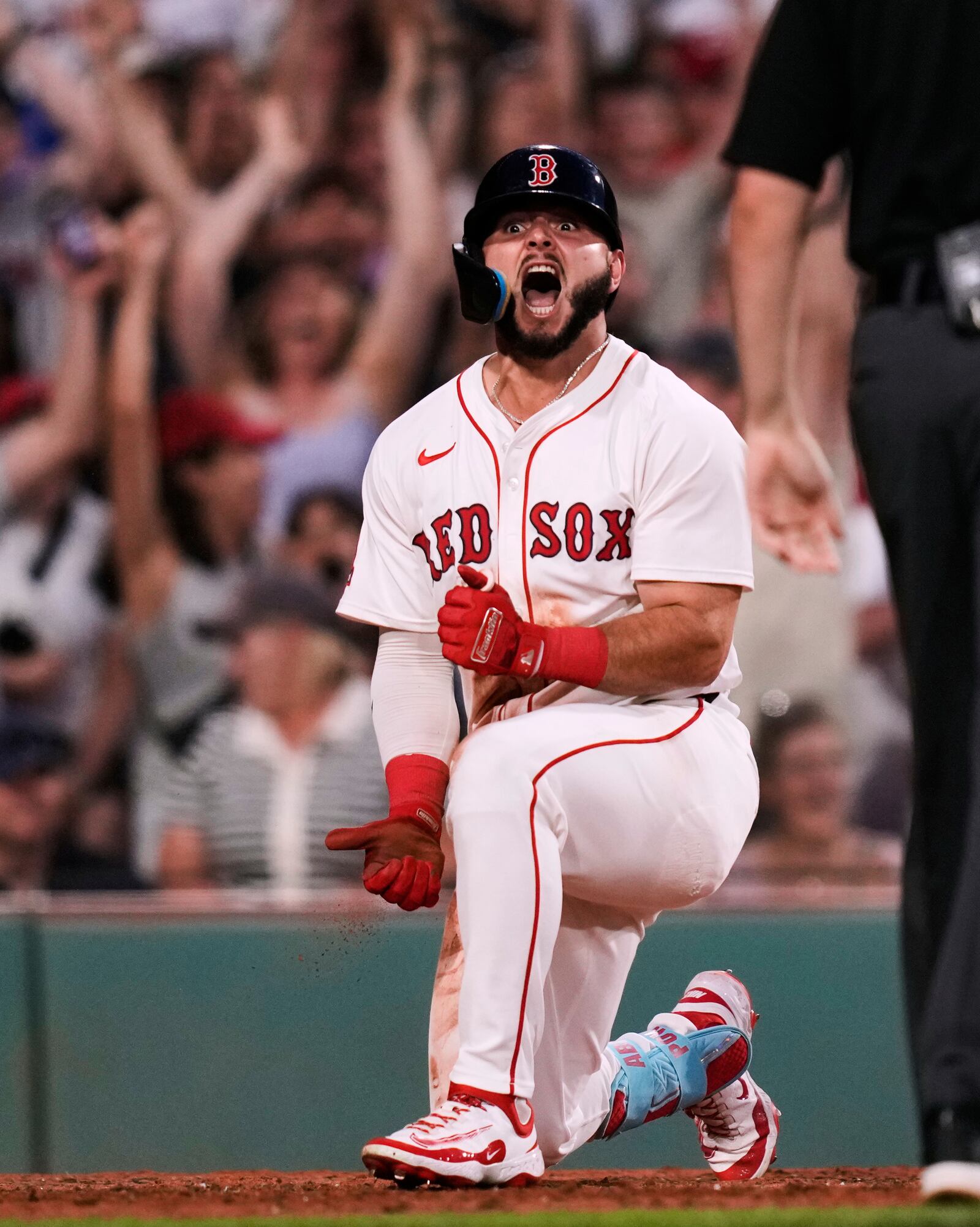 Boston Red Sox's Wilyer Abreu celebrates after his inside-the-park home run off Cincinnati Reds pitcher Joe LaSorsa during the fifth inning of a baseball game at Fenway Park, Monday, June 30, 2025, in Boston. (AP Photo/Charles Krupa)