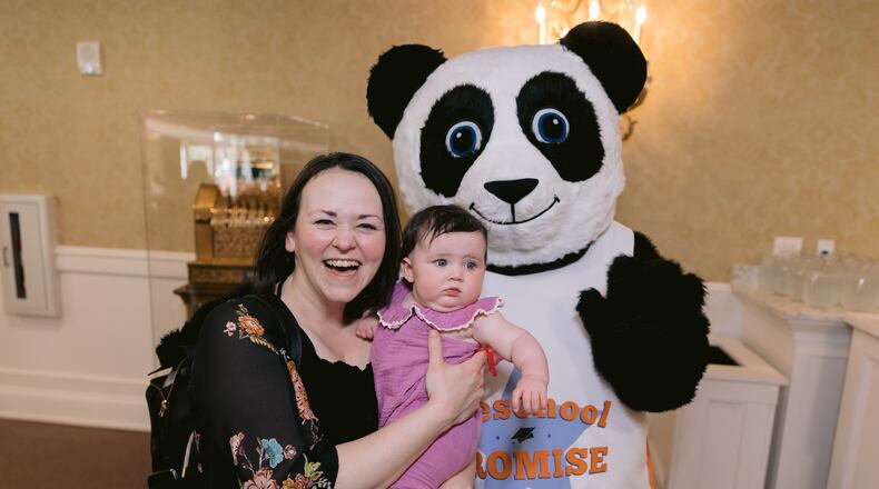 Attendees pose with the Preschool Promise panda during the second annual awards banquet from Preschool Promise. CONTRIBUTED