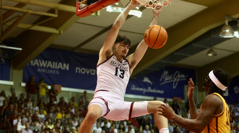 Dayton's Isaac Jack dunks against Iowa State in the Maui Invitational on Monday, Nov. 25, 2024, at the Lahaina Civic Center. David Jablonski/Staff