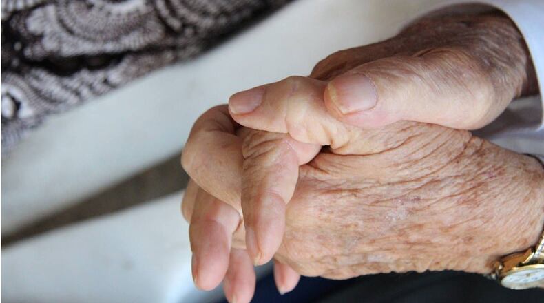 A Connecticut man held up a sign to show his love for his wife on their 67th anniversary. The woman is in a nursing home, which is restricting visitors because of the coronavirus.
