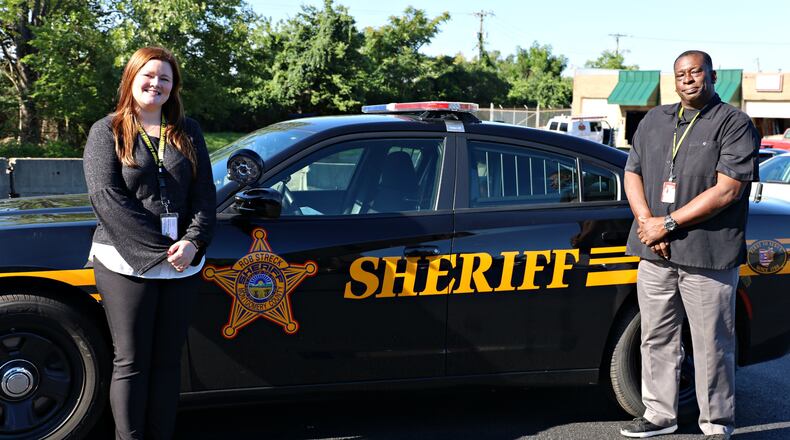 Crisis Intervention Team co-responders Sarah P., left, and William C.
