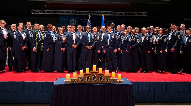 Wright-Patterson Air Force Base chief master sergeants join the 14 recently selected chiefs for a group photo at the end of the Wright-Patterson Chief Master Sergeant Recognition Ceremony on May 14 at the National Museum of the U.S. Air Force. U.S. AIR FORCE PHOTO/R.J. ORIEZ