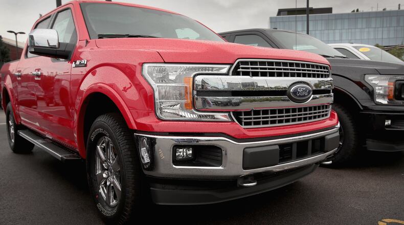 CHICAGO, IL - Ford F-150 pickup trucks are offered for sale at a dealership on Sept. 6, 2018 in Chicago, Illinois. Ford loves to point out that an F-Series pickup rolls off the assembly line every 53 seconds or so. (Photo by Scott Olson/Getty Images)