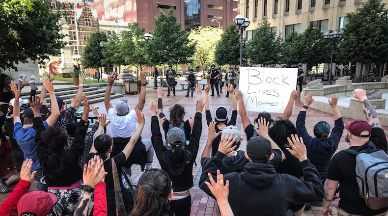 Protesters at Courthouse Square in Dayton Sunday, May 31, 2020. JIM NOELKER / STAFF