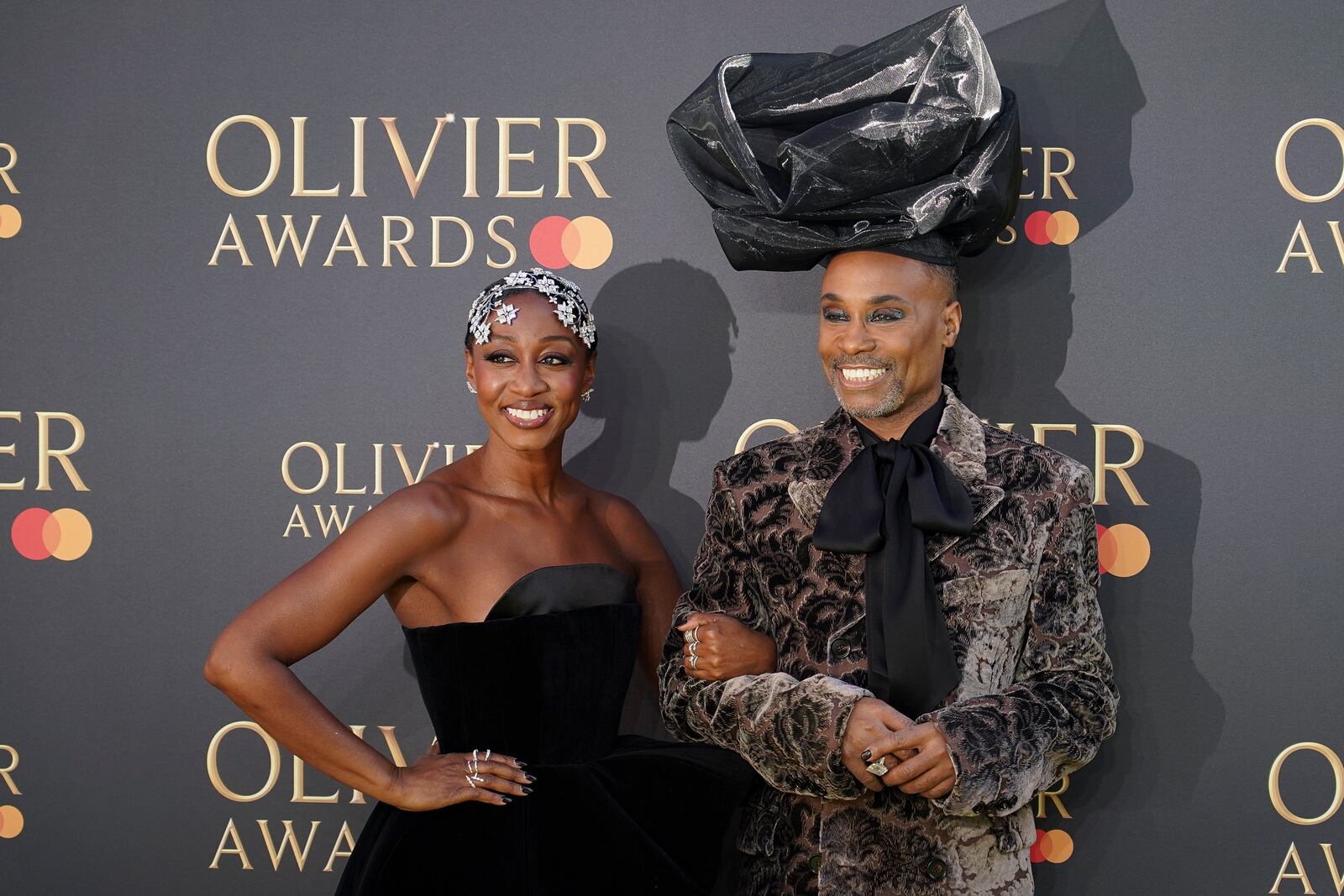Beverley Knight, left and Billy Porter pose for photographers upon arrival at the Olivier Awards on Sunday, April 6, 2025, in London. (Photo by Alberto Pezzali/Invision/AP)