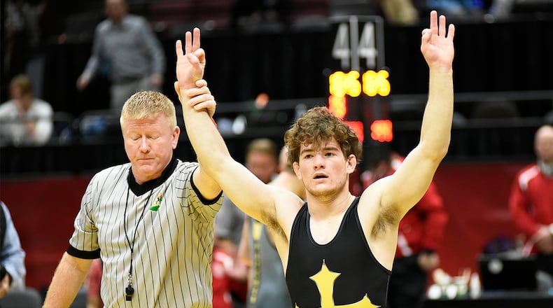 Legacy Christian senior Nathan Attisano celebrates after winning his third consecutive state title at the OHSAA State Wrestling Championships on Sunday, March 15, 2026 at Ohio State University's Schottenstein Center. GEOFF NEVILLE / CONTRIBUTING WRITER
