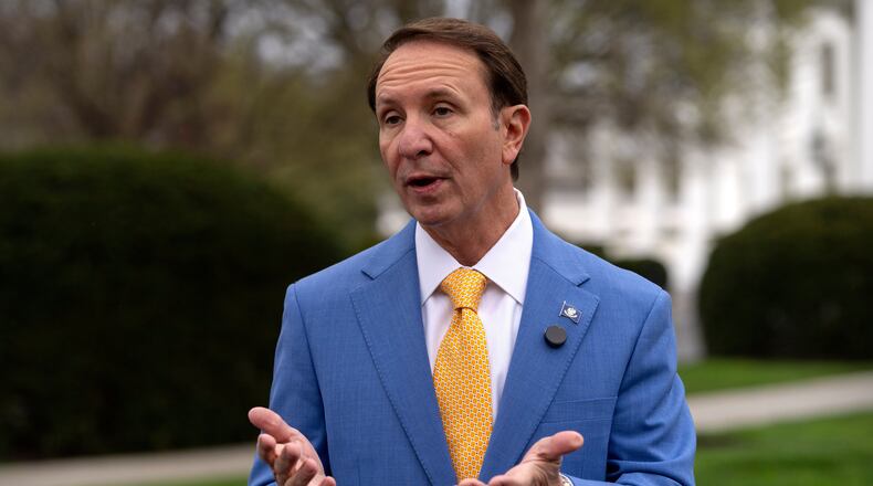 FILE - Louisiana Gov. Jeff Landry records a social media video outside the White House, Monday, March 24, 2025, in Washington. (AP Photo/Mark Schiefelbein, File)
