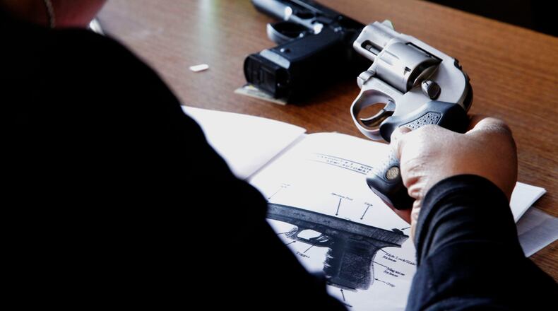 Sanford Whitlow has been teaching CCW classes since it became legal in Ohio to conceal and carry a firearm. STAFF FILE