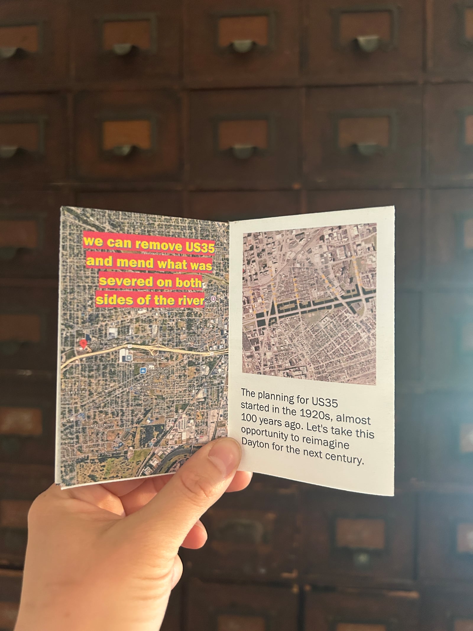 A pamphlet about the proposed removal of US 35, which when constructed cut through residential neighborhoods in Dayton. Architect Matt Sauer is an advocate for its streamlining. HANNAH KASPER/CONTRIBUTED