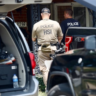 Homeland security, searching a home at 3759 Woodbury Drive, Friday, July 26, 2024. MARSHALL GORBY \STAFF