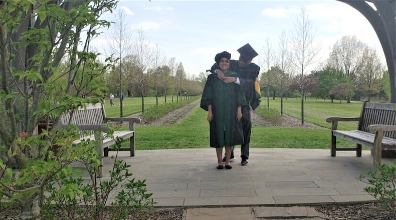 Rinki Goswami graduated from the Wright State University Boonshoft School of Medicine on Saturday. Goswami’s family watched the virtual graduation ceremony together as her father ceremoniously “hooded” her at Cox Arboretum MetroPark. CONTRIBUTED.