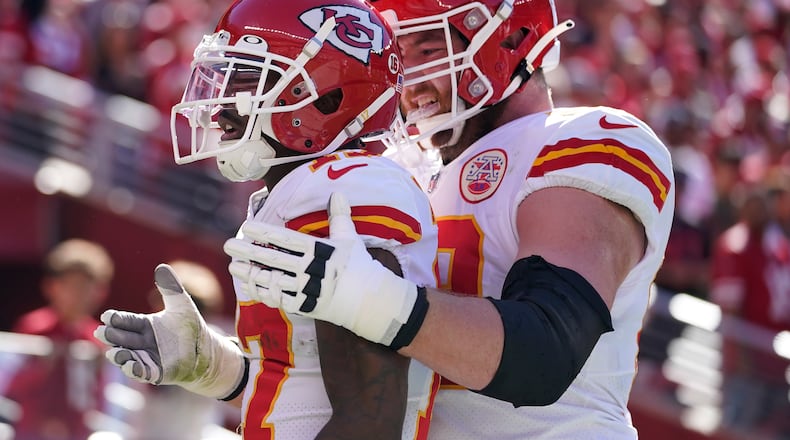 Kansas City Chiefs wide receiver Mecole Hardman, left, celebrates after scoring a touchdown with guard Joe Thuney during the first half of an NFL football game against the San Francisco 49ers in Santa Clara, Calif., Sunday, Oct. 23, 2022. (AP Photo/Godofredo A. Vásquez)