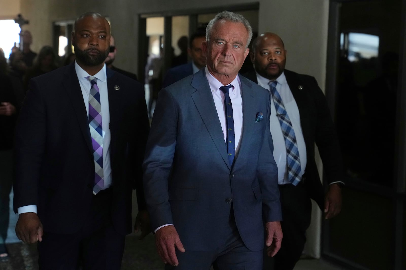 U.S. Health Secretary Robert F. Kennedy Jr. tours the Native Health Mesa Food Distribution Center in Mesa, Ariz., Tuesday, April 8, 2025. (AP Photo/Ross D. Franklin)