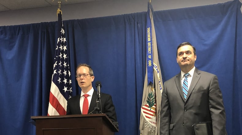 Then-Interim U.S. Attorney Benjamin C. Glassman and Acting Special Agent in Charge of the FBI, Cincinnati division, announce indictment of Steve Rauch, 65, of Germantown, Joyce Sutton Cameron, 72, of Trotwood, and James Cameron, 81, of Trotwood, in Dayton. LYNN HULSEY/Staff photo