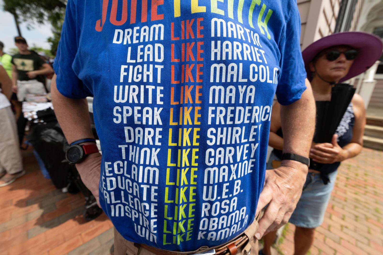 Paul Wendell wears a Juneteenth themed t-shirt during a Juneteenth celebration at the African Burying Ground Memorial Park Thursday, June 19, 2025, in Portsmouth, N.H. (AP Photo/Michael Dwyer)