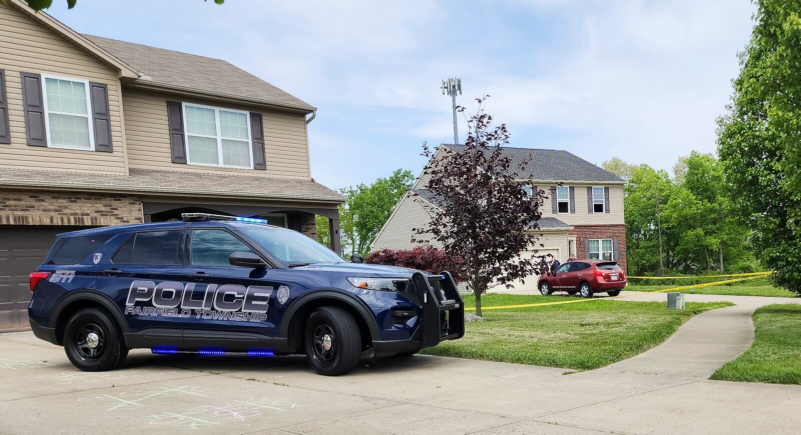 Fairfield Township police and fire crews along with Butler County fire investigation team and State Fire Investigators investigate a fire on Arroyo Ridge Court in Fairfield Township Thursday, May 11, 2023. A woman was transported by medical helicopter with burn injuries. NICK GRAHAM/STAFF