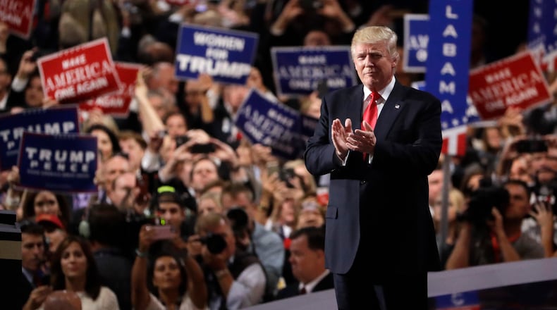 Republican presidential candidate Donald Trump takes the stage during the final day of the Republican National Convention in Cleveland, Thursday, July 21, 2016. (AP Photo/Matt Rourke)