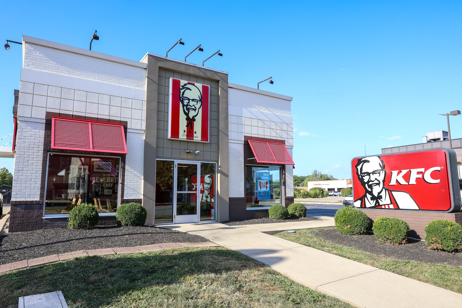 The KFC on West Main Street in downtown Xenia has been listed for sale. BRYANT BILLING / STAFF