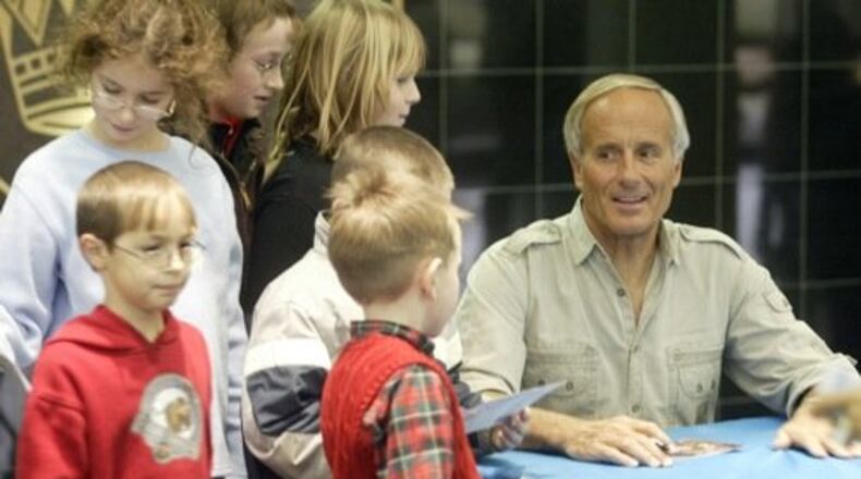 Director of the Columbus Zoo and Aquarium Jack Hanna signs autographs for children prior to his program "Go Wild With Jack Hanna" at Cedarville University on Nov. 22, 2008. LISA POWELL / STAFF FILE