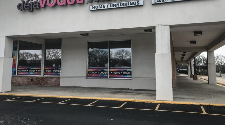 Déjà Vogue Fashion & Home Goods Outlet off Bigger Road in Kettering is the focus of a lengthy multi-jurisdictional police investigation following a complaint about knock-off merchandise that led to three raids Monday, April 5, 2021, in Kettering, Centerville and Huber Heights. JIM NOELKER / STAFF