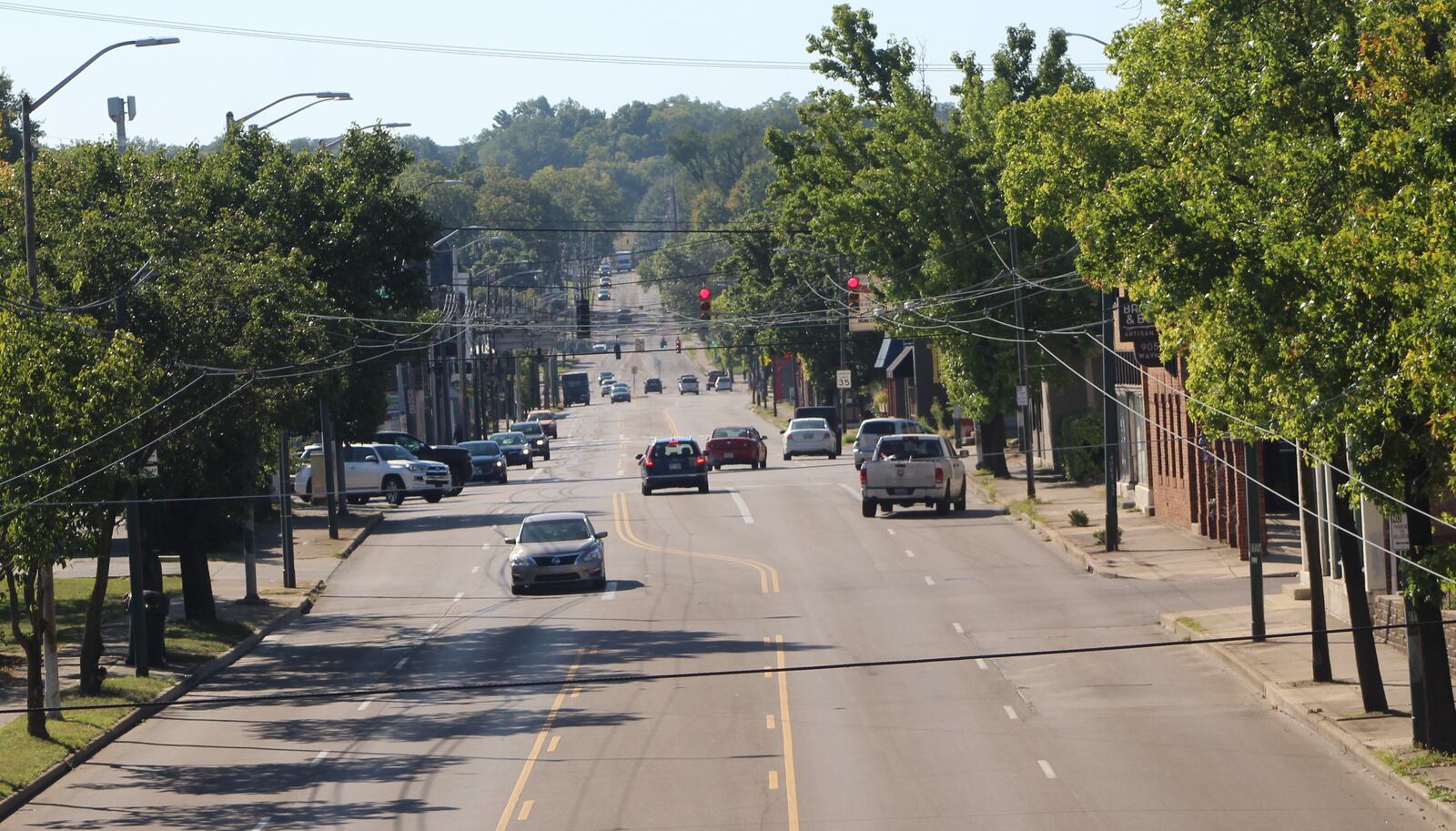 A group called the Wayne Avenue Traffic Safety Coalition is asking the city to redesign a 0.5-mile stretch of Wayne Avenue from Wyoming Street to the U.S. 35 overpass. They want the city to reduce the lanes of traffic, lower the  speed limit and add bike lanes and wider sidewalks. CORNELIUS FROLIK / STAFF