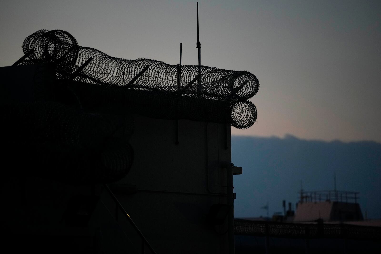 FILE -Exterior view of Shek Pik Prison is seen in Hong Kong, Jan. 19, 2022. (AP Photo/Kin Cheung, File)