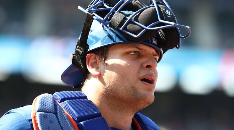 Mets catcher Devin Mesoraco looks on against the Washington Nationals during their game at Citi Field on July 15, 2018 in New York City. (Photo by Al Bello/Getty Images)